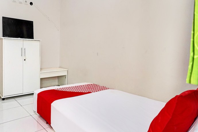 Imagen de la habitación del Hotel OYO Life 92684 Kost Mutiara Nirwana. Foto 7