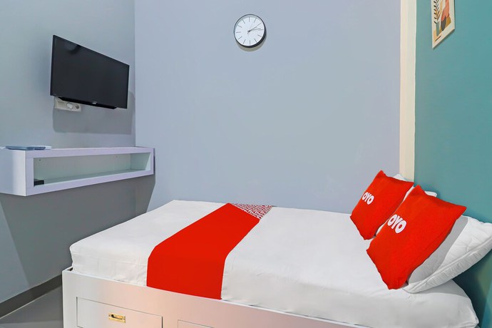 Imagen de la habitación del Hotel OYO Life 92691 Mc Kost Syariah. Foto 4