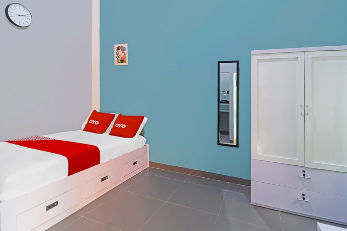 Imagen de la habitación del Hotel OYO Life 92691 Mc Kost Syariah. Foto 5