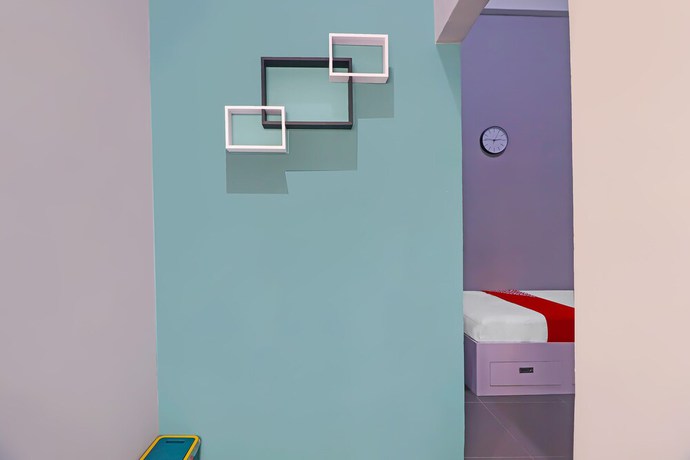 Imagen de la habitación del Hotel OYO Life 92691 Mc Kost Syariah. Foto 7