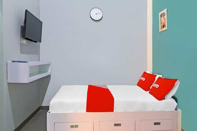 Imagen de la habitación del Hotel OYO Life 92691 Mc Kost Syariah. Foto 9