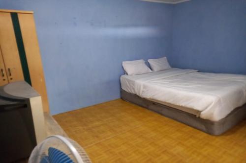 Imagen general del Hotel OYO Life 92694 Kost Nino. Foto 11