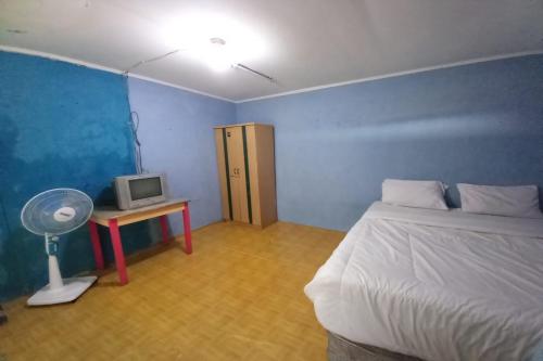 Imagen general del Hotel OYO Life 92694 Kost Nino. Foto 14