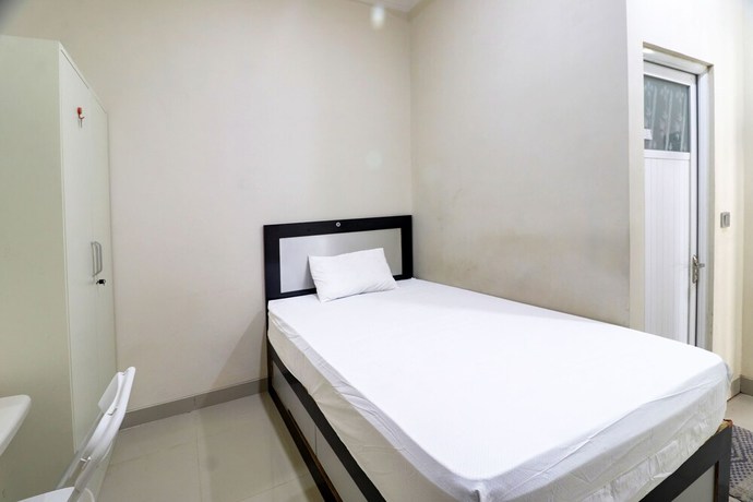 Imagen de la habitación del Hotel OYO Life 92707 D-akomiba Residence. Foto 3