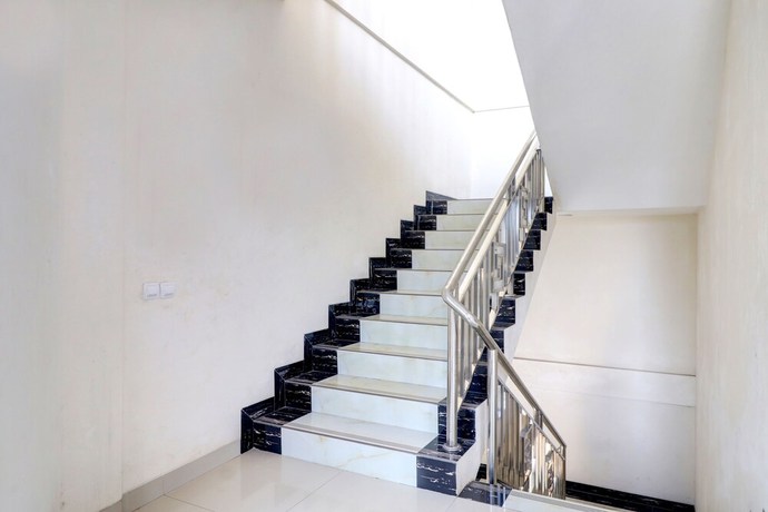 Imagen de los interiores del Hotel OYO Life 92707 D-akomiba Residence. Foto 14