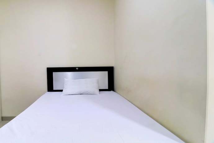 Imagen de la habitación del Hotel OYO Life 92707 D-akomiba Residence. Foto 10