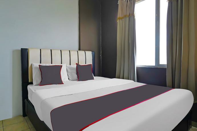 Imagen de la habitación del Hotel OYO Life 92774 The Edge Apartment By My Home. Foto 10