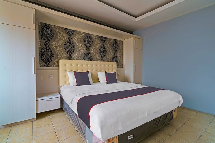 Imagen de la habitación del Hotel OYO Life 92774 The Edge Apartment By My Home. Foto 11