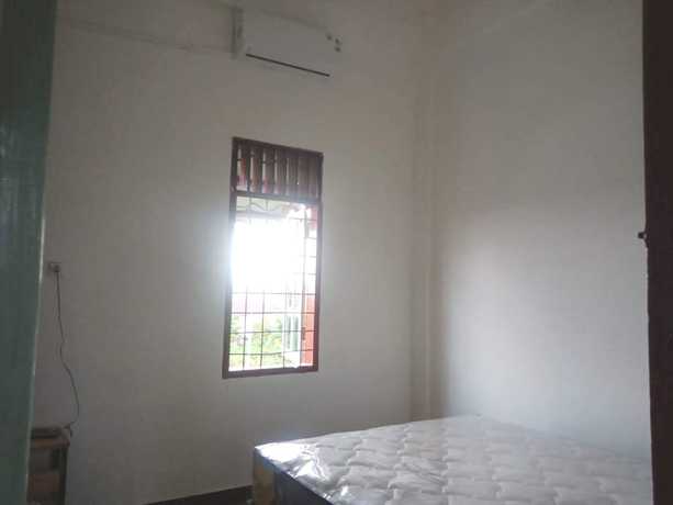Imagen de la habitación del Hotel OYO Life 92779 Kost Arjuna. Foto 15