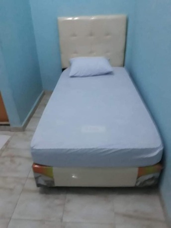 Imagen de la habitación del Hotel OYO Life 92780 Kost Bara. Foto 5