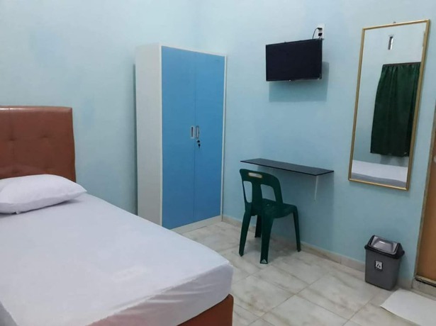 Imagen de la habitación del Hotel OYO Life 92780 Kost Bara. Foto 10