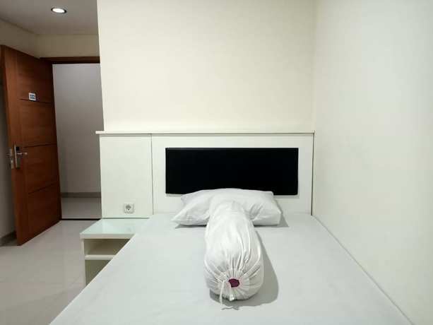 Imagen de la habitación del Hotel OYO Life 92841 Kos 88. Foto 10