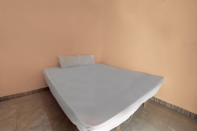 Imagen de la habitación del Hotel OYO Life 92846 Kost Putra Griya Eka. Foto 2