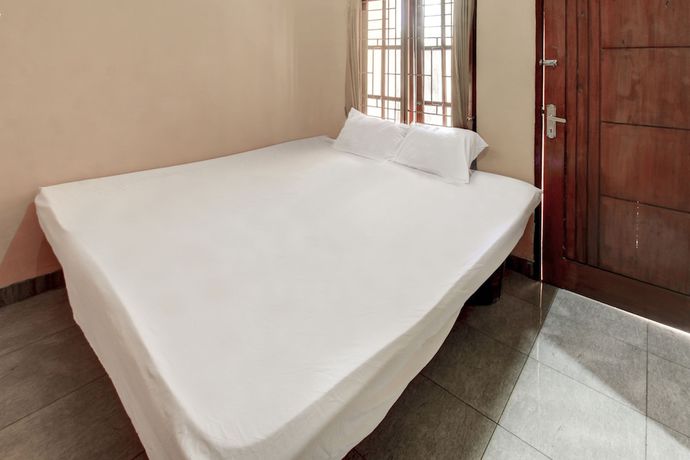 Imagen de la habitación del Hotel OYO Life 92846 Kost Putra Griya Eka. Foto 3