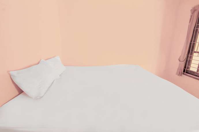 Imagen de la habitación del Hotel OYO Life 92846 Kost Putra Griya Eka. Foto 4