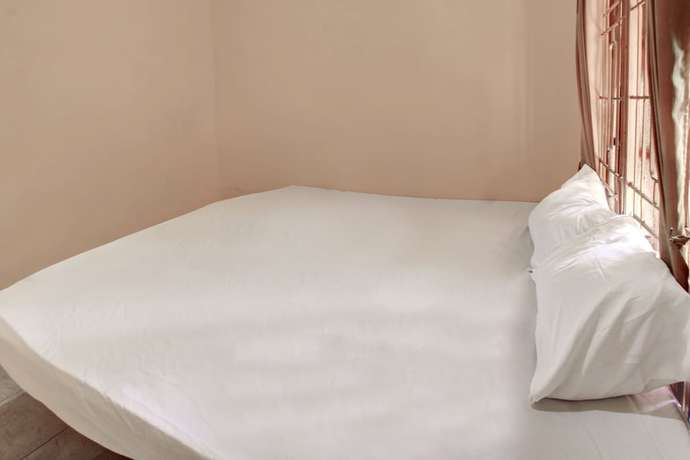 Imagen de la habitación del Hotel OYO Life 92846 Kost Putra Griya Eka. Foto 6