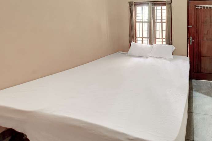 Imagen de la habitación del Hotel OYO Life 92846 Kost Putra Griya Eka. Foto 7