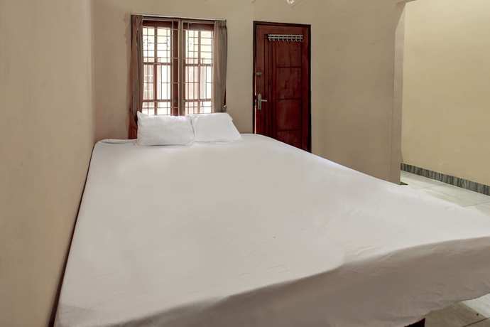 Imagen de la habitación del Hotel OYO Life 92846 Kost Putra Griya Eka. Foto 9