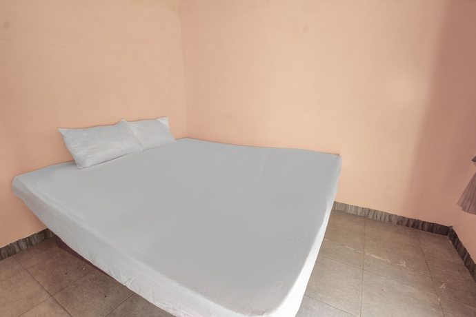 Imagen de la habitación del Hotel OYO Life 92846 Kost Putra Griya Eka. Foto 10