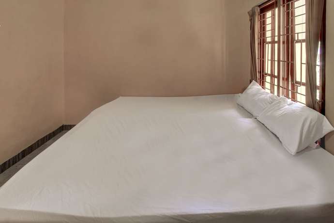 Imagen de la habitación del Hotel OYO Life 92846 Kost Putra Griya Eka. Foto 13