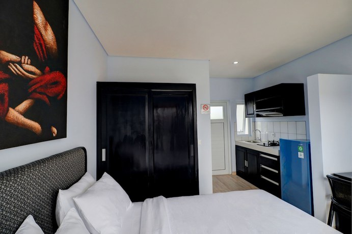 Imagen de la habitación del Hotel OYO Life 92854 The Danari House. Foto 14