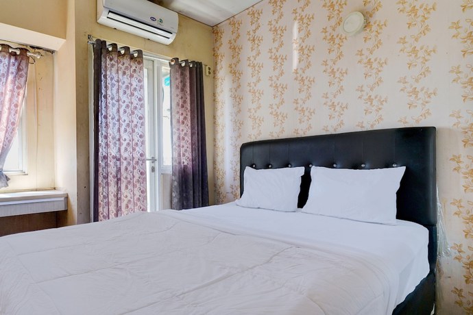 Imagen de la habitación del Hotel OYO Life 92874 Apartement Grand Sentraland Karawang By Red Dragon. Foto 3