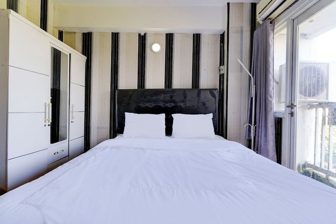 Imagen de la habitación del Hotel OYO Life 92874 Apartement Grand Sentraland Karawang By Red Dragon. Foto 4
