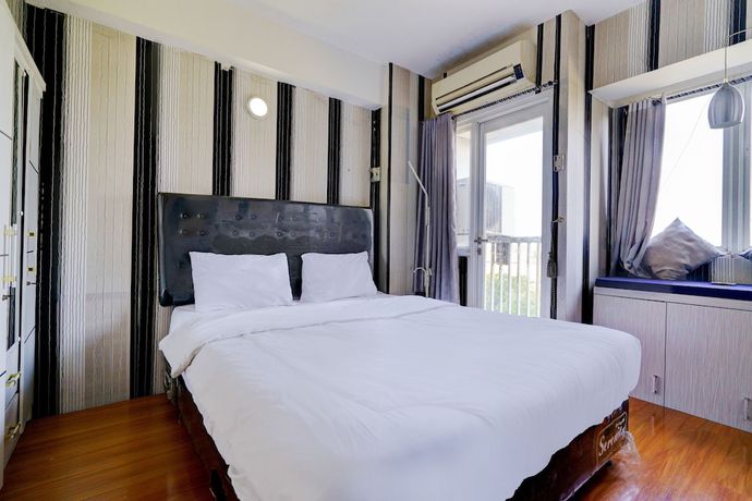 Imagen de la habitación del Hotel OYO Life 92874 Apartement Grand Sentraland Karawang By Red Dragon. Foto 5