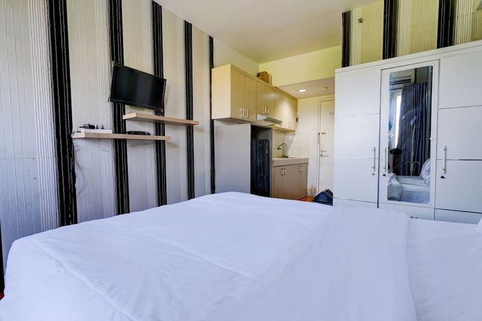 Imagen de la habitación del Hotel OYO Life 92874 Apartement Grand Sentraland Karawang By Red Dragon. Foto 6