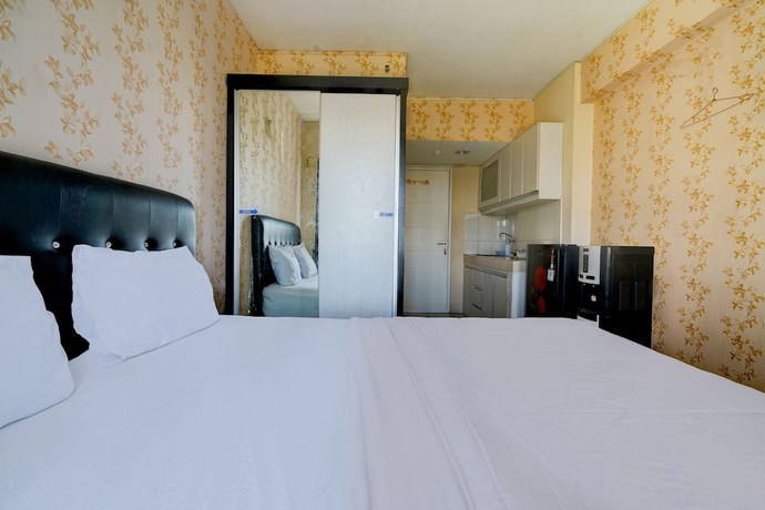 Imagen de la habitación del Hotel OYO Life 92874 Apartement Grand Sentraland Karawang By Red Dragon. Foto 8