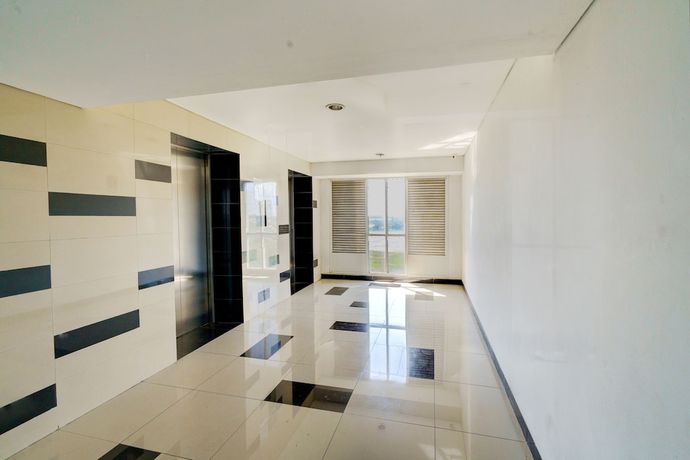 Imagen de los interiores del Hotel OYO Life 92874 Apartement Grand Sentraland Karawang By Red Dragon. Foto 16