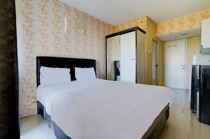 Imagen de la habitación del Hotel OYO Life 92874 Apartement Grand Sentraland Karawang By Red Dragon. Foto 10