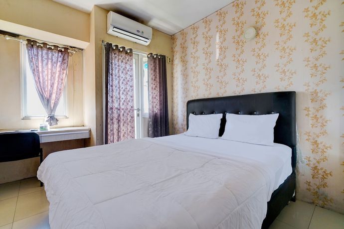 Imagen de la habitación del Hotel OYO Life 92874 Apartement Grand Sentraland Karawang By Red Dragon. Foto 12