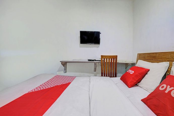 Imagen de la habitación del Hotel OYO Life 92877 Rainbow 7296. Foto 7