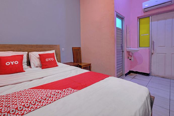 Imagen de la habitación del Hotel OYO Life 92877 Rainbow 7296. Foto 11