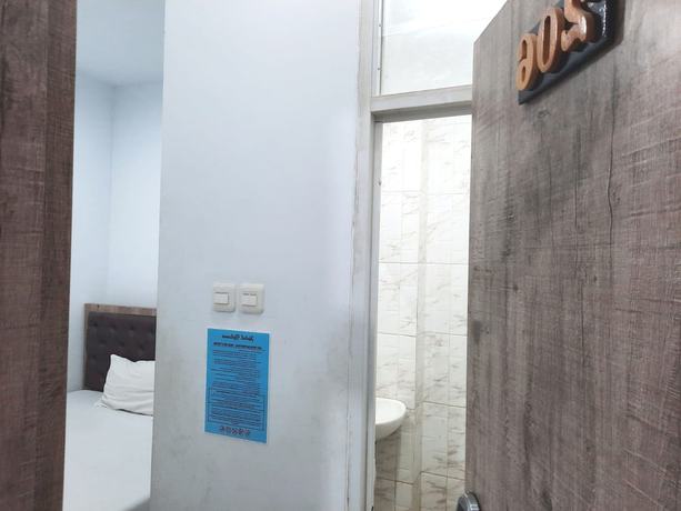 Imagen de la habitación del Hotel OYO Life 92883 Kost Ratana Cengkareng Syariah. Foto 1