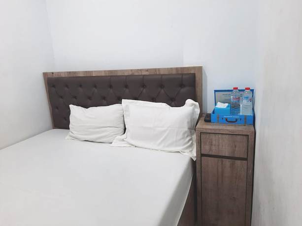 Imagen de la habitación del Hotel OYO Life 92883 Kost Ratana Cengkareng Syariah. Foto 6