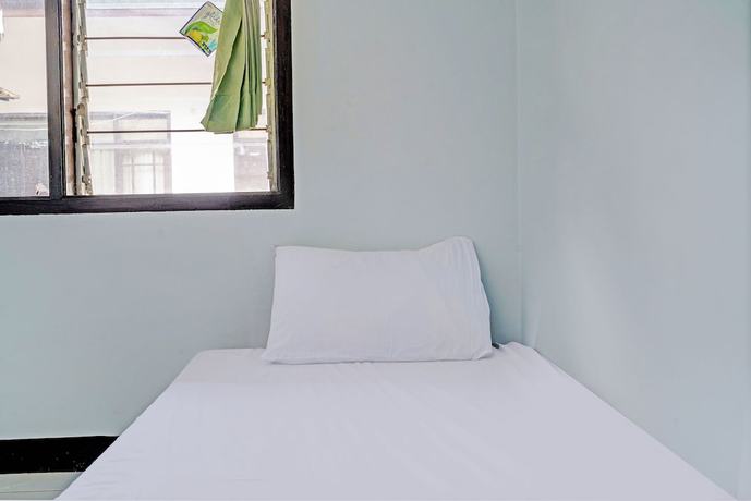Imagen de la habitación del Hotel OYO Life 92901 Kost Bu Nur. Foto 7