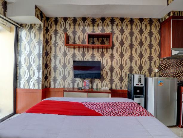 Imagen de la habitación del Hotel OYO Life 92910 Apartemen Tamansari Panoramic By Tira. Foto 11