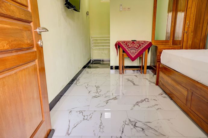 Imagen de la habitación del Hotel OYO Life 92922 Kost Bu Mala 1 Syariah. Foto 3