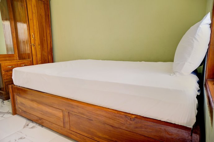 Imagen de la habitación del Hotel OYO Life 92922 Kost Bu Mala 1 Syariah. Foto 6