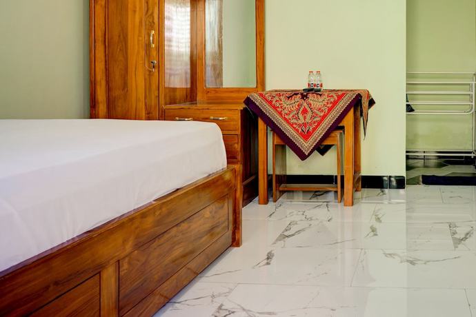 Imagen de la habitación del Hotel OYO Life 92922 Kost Bu Mala 1 Syariah. Foto 9