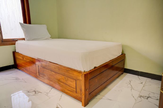 Imagen de la habitación del Hotel OYO Life 92922 Kost Bu Mala 1 Syariah. Foto 10