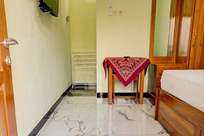 Imagen de la habitación del Hotel OYO Life 92922 Kost Bu Mala 1 Syariah. Foto 11