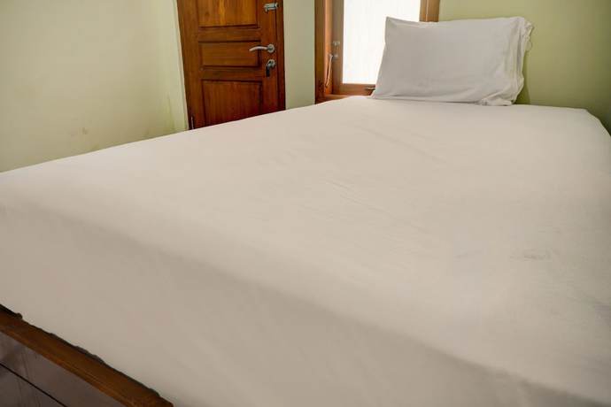 Imagen de la habitación del Hotel OYO Life 92922 Kost Bu Mala 1 Syariah. Foto 13