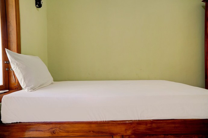 Imagen de la habitación del Hotel OYO Life 92922 Kost Bu Mala 1 Syariah. Foto 18