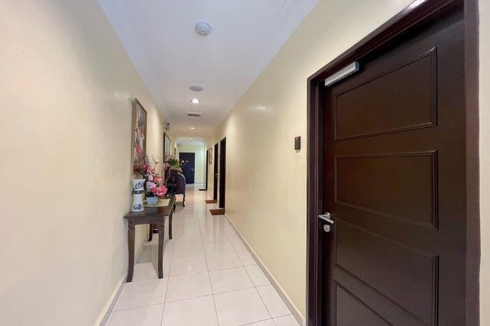 Imagen de la habitación del Hotel OYO Life 92925 Kost Bu Mala 2 Syariah. Foto 3