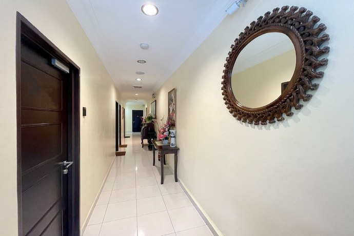 Imagen de la habitación del Hotel OYO Life 92925 Kost Bu Mala 2 Syariah. Foto 4