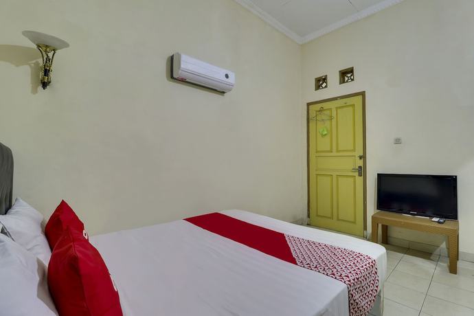 Imagen de la habitación del Hotel OYO Life 92978 Apartement Gateway Cicadas By Az Pro. Foto 1