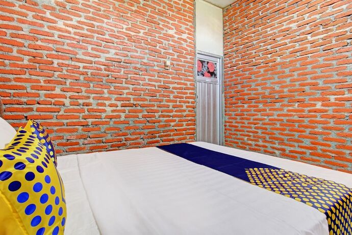 Imagen de la habitación del Hotel OYO Life 93010 Omah Bareng Syariah Sambisari. Foto 17